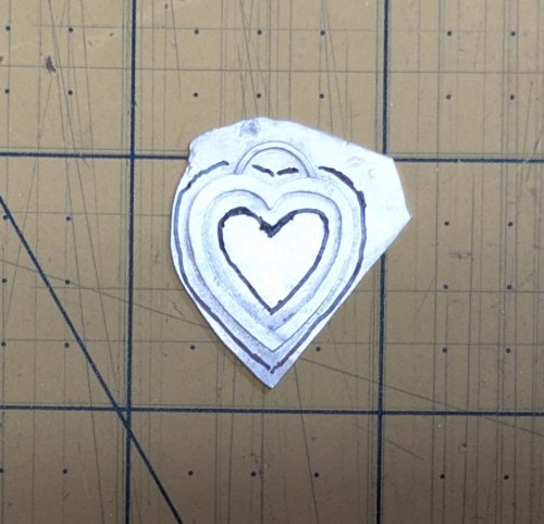 Judy Larson's Hearts and Flowers Charms - , Classic Wire Jewelry, Cutting, Cutting Tool, Cutters, Filing, Finishing, Butane Torch, Soldering, Solder, Design, Trim away excess metal.